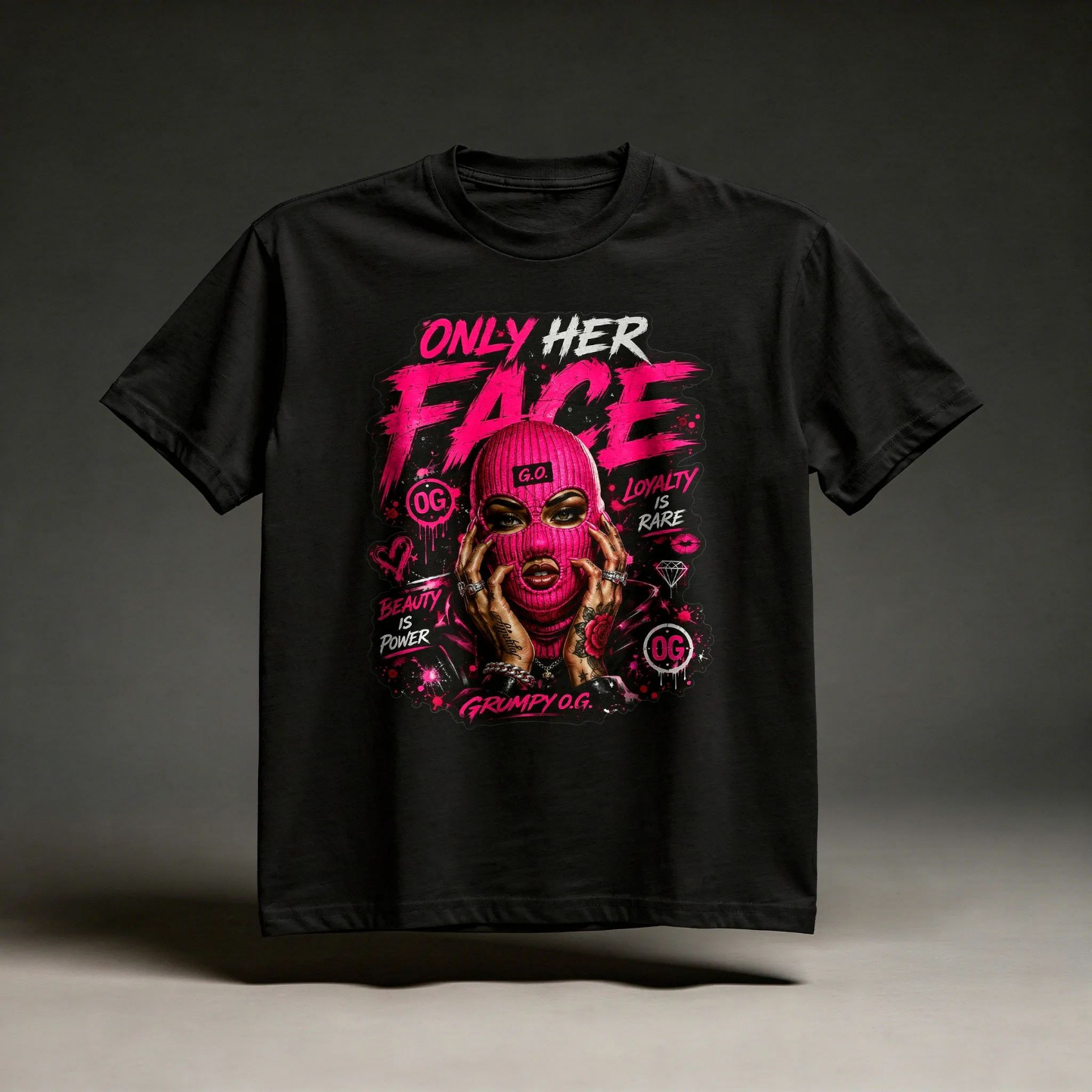 Black Pink Rebellion™ Tee featuring a bold hot-pink masked woman graphic with rebellious lettering and high-impact women’s streetwear artwork on the front.