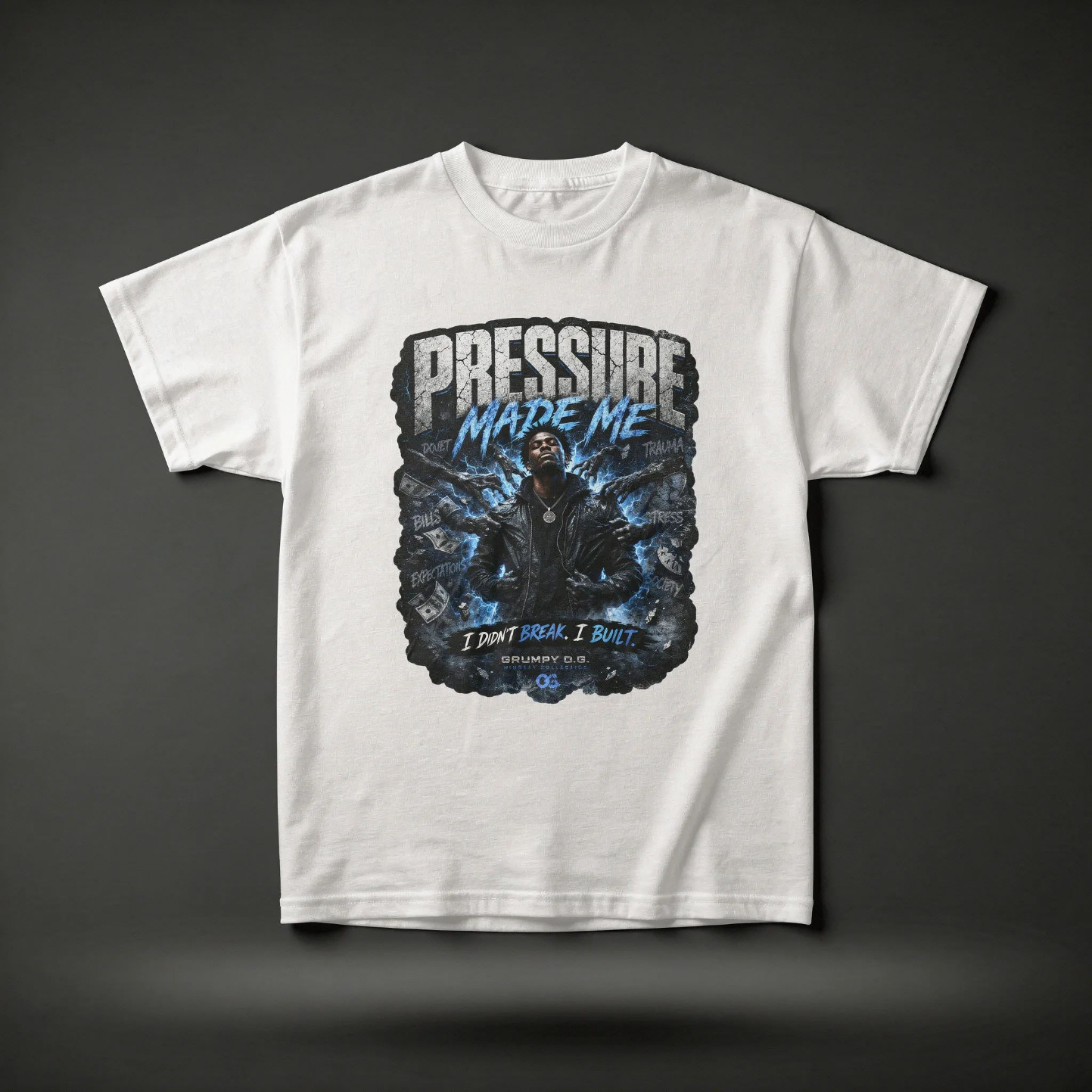White Pressure Built™ Tee featuring a bold resilience graphic with electric blue details, pressure-driven messaging and premium mindset streetwear artwork on the front.