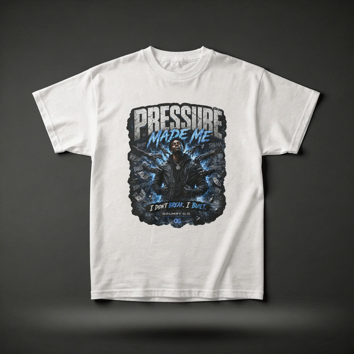 White Pressure Built™ Tee featuring a bold resilience graphic with electric blue details, pressure-driven messaging and premium mindset streetwear artwork on the front.
